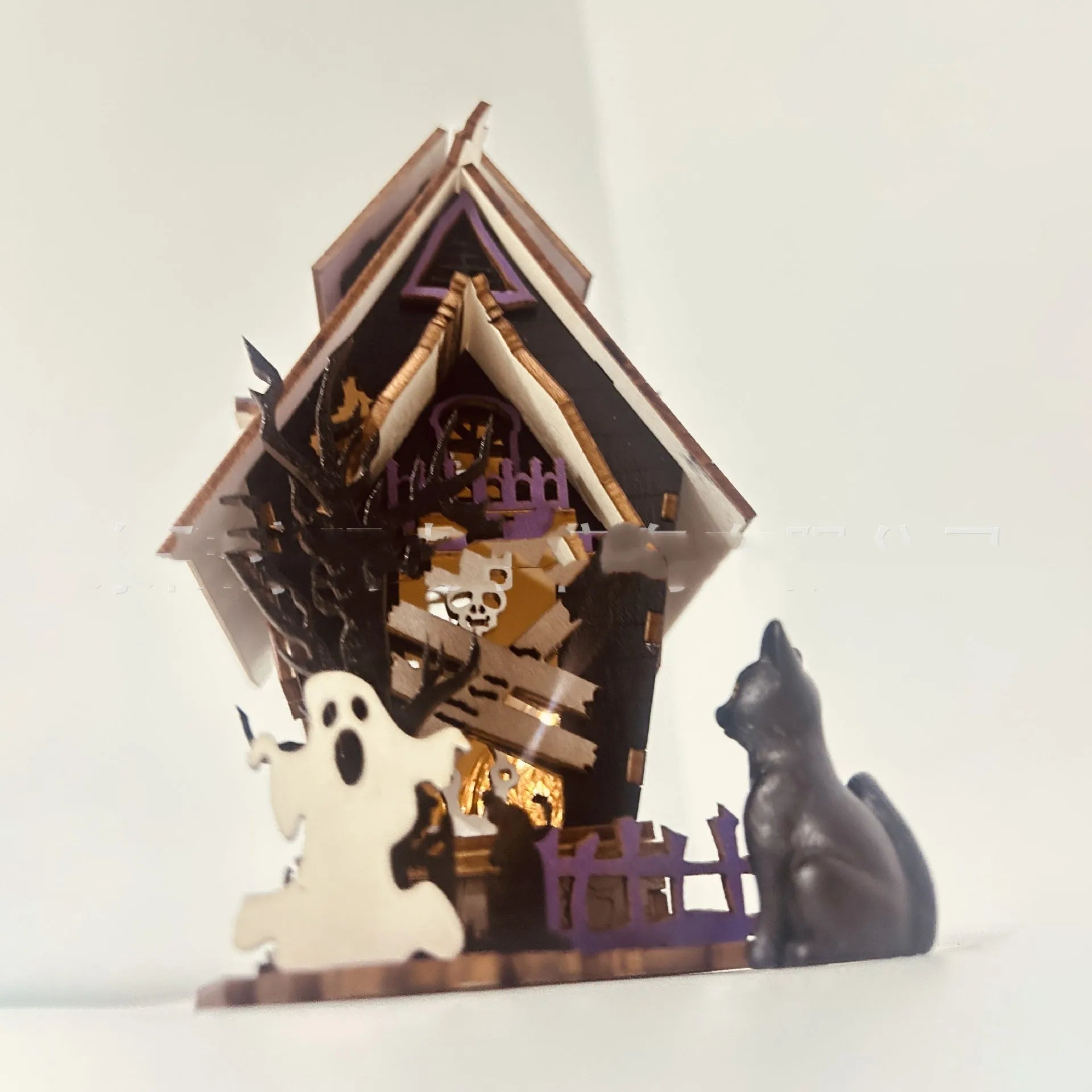Wooden Halloween haunted house table decoration with candlestick design