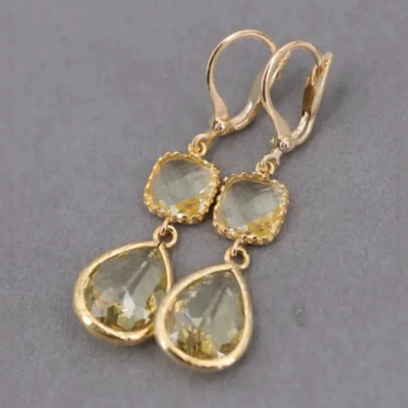 Gold geometric earrings with long crystal fringe and water droplet design