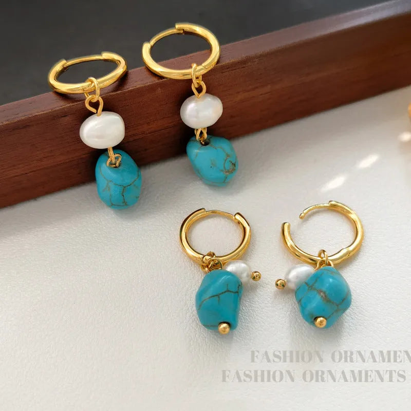 Irregular turquoise and cultured pearl earrings with geometric copper settings in both dangle and stud styles