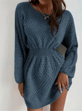 Blue women's knitted dress with crocheted flowers, round neck, and fitted waist.