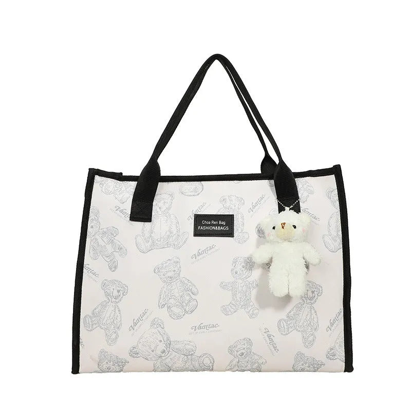 Women's printed canvas tote bag with rhombus pattern and sandwich pockets in black colour option