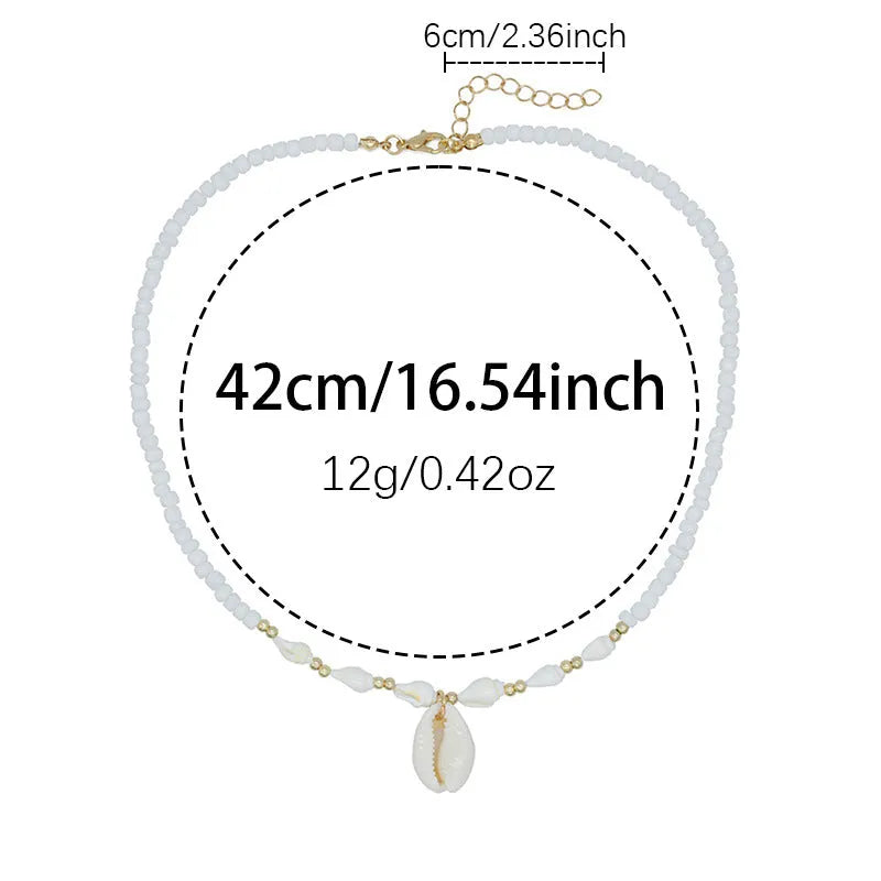 White Mother of Pearl conch shell pendant necklace on an electroplated chain.
