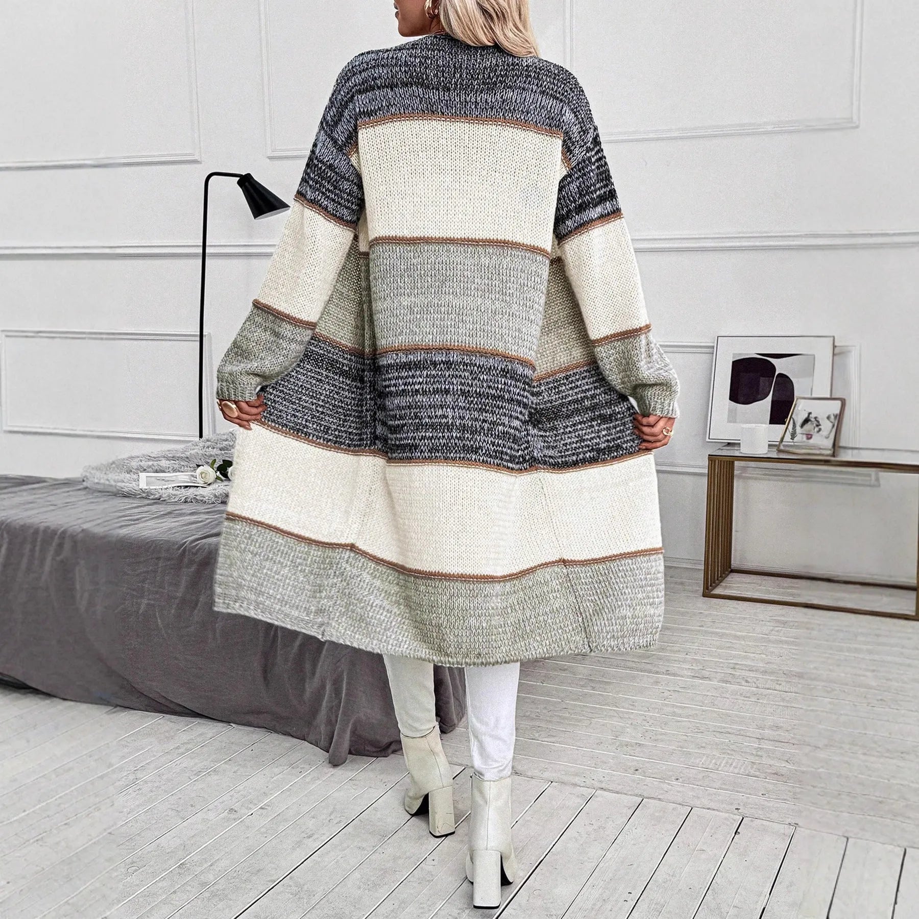 Grey striped knitted women's cardigan with long sleeves and loose fit