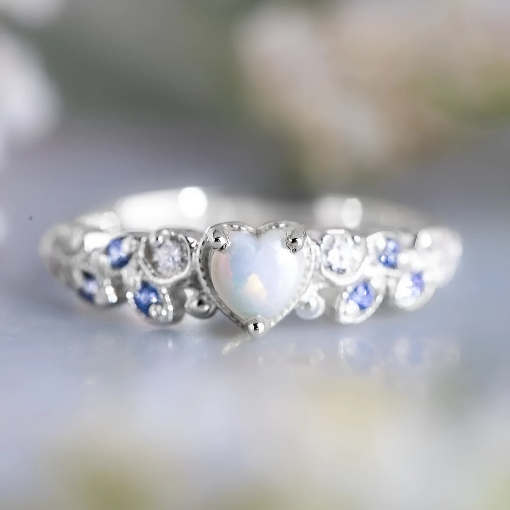 White alloy women's ring with a heart shape and floral opal ocean design.