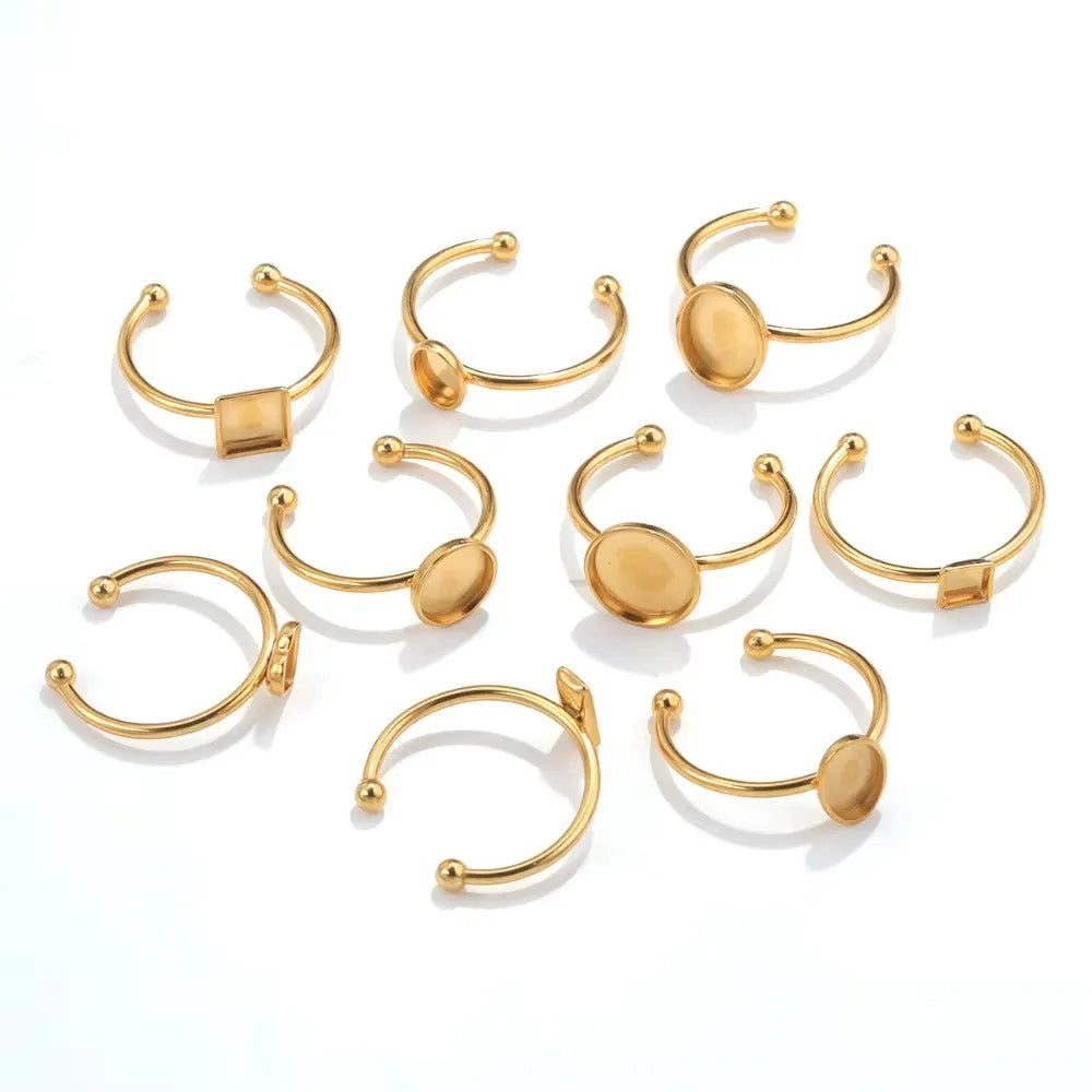 Stainless steel golden electroplated ring setting with totem pattern for DIY jewellery making.