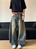 Retro blue distressed men's jeans with wide leg fit and micro elastic cotton blend fabric