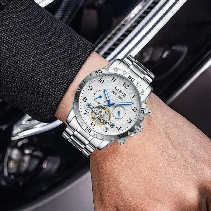 Men's silver stainless steel automatic perpetual calendar watch with sapphire crystal glass.