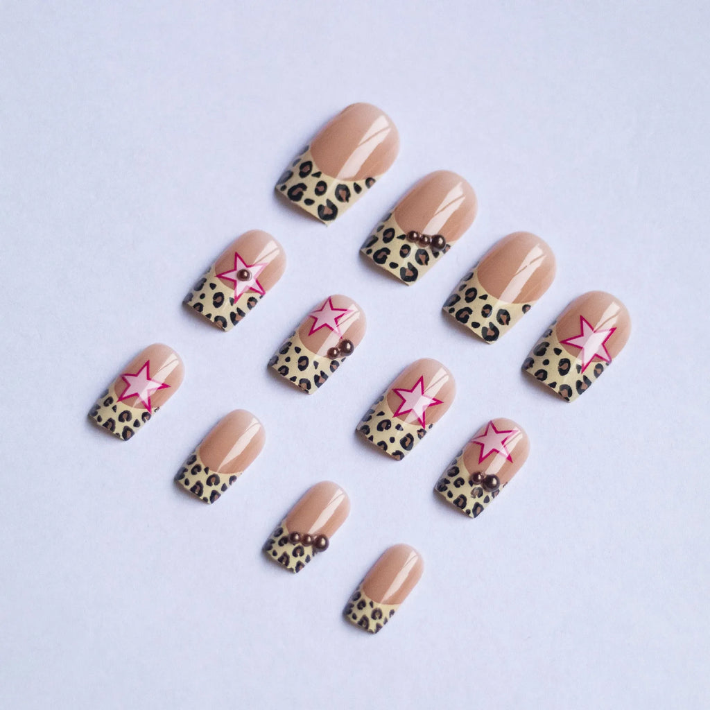 French manicure nail art set with leopard print patterns, five-pointed stars, pearls and diamond decorations