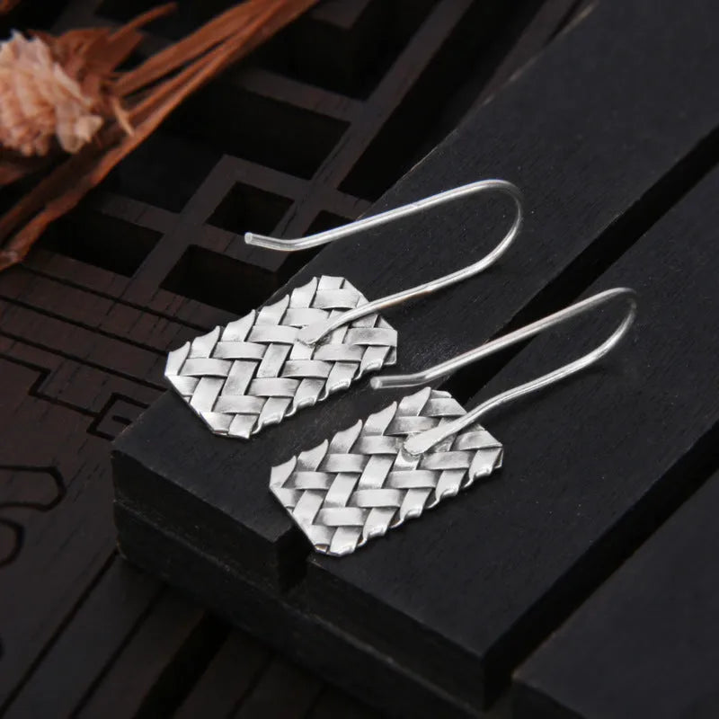 Silver geometric diamond plaid woven drop earrings, 17.5mm x 11mm, made from 925 sterling silver.