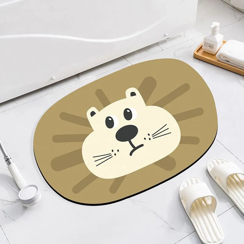 Cartoon animal diatom oil absorbent non-slip bathroom mat in alien shape on a bathroom floor.
