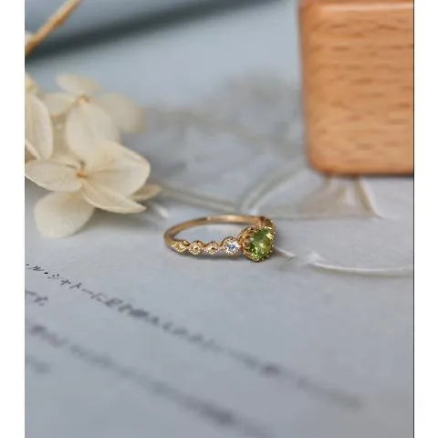 Japanese style copper ring with geometric quadrilateral design and imitation peridot appearance