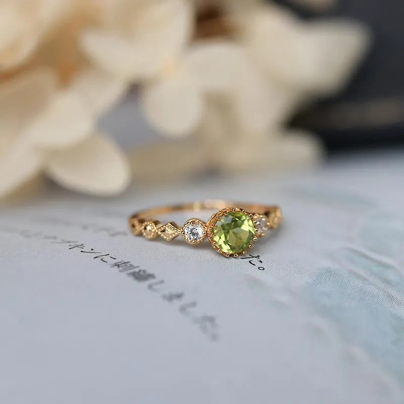 Japanese style copper ring with geometric quadrilateral design and imitation peridot appearance