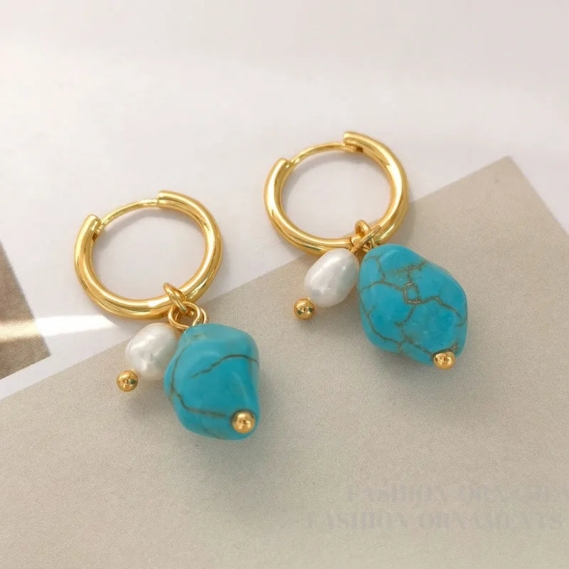 Irregular turquoise and cultured pearl earrings with geometric copper settings in both dangle and stud styles