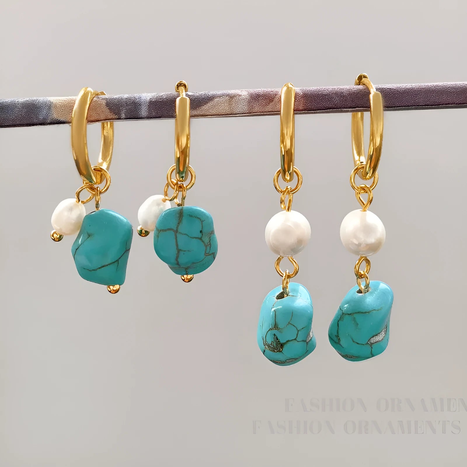 Irregular turquoise and cultured pearl earrings with geometric copper settings in both dangle and stud styles