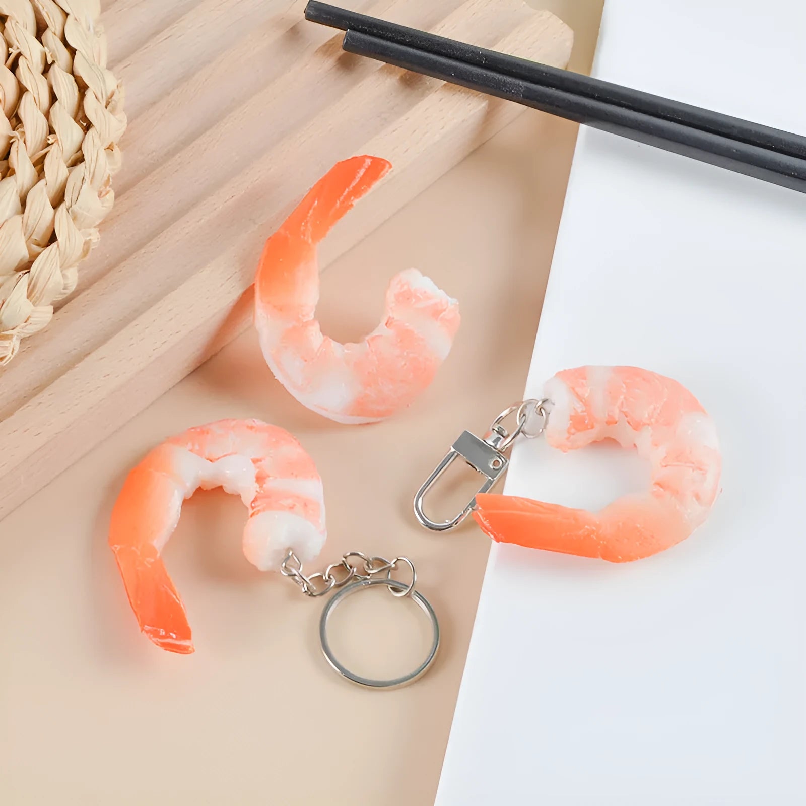 PVC injection moulded shrimp-shaped keychain with door buckle, 1.5cm thick, on a white background.