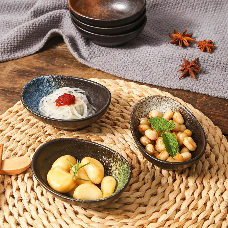 Oval Japanese ceramic sauce dipping bowl with traditional pattern design