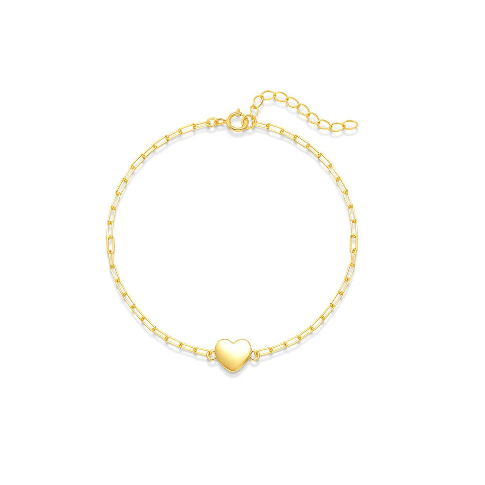S925 sterling silver bracelet with geometric heart charm and clip chain fastening in gold plating