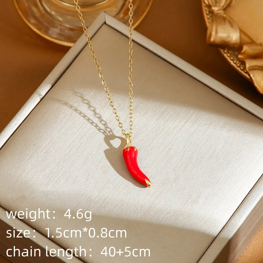 Titanium steel necklace with an indie-style cherry, strawberry, and pepper pendant on an O-ring chain.