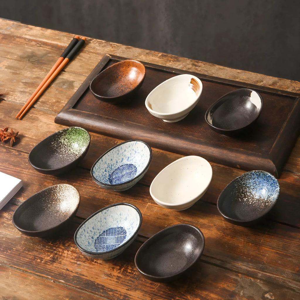 Oval Japanese ceramic sauce dipping bowl with traditional pattern design