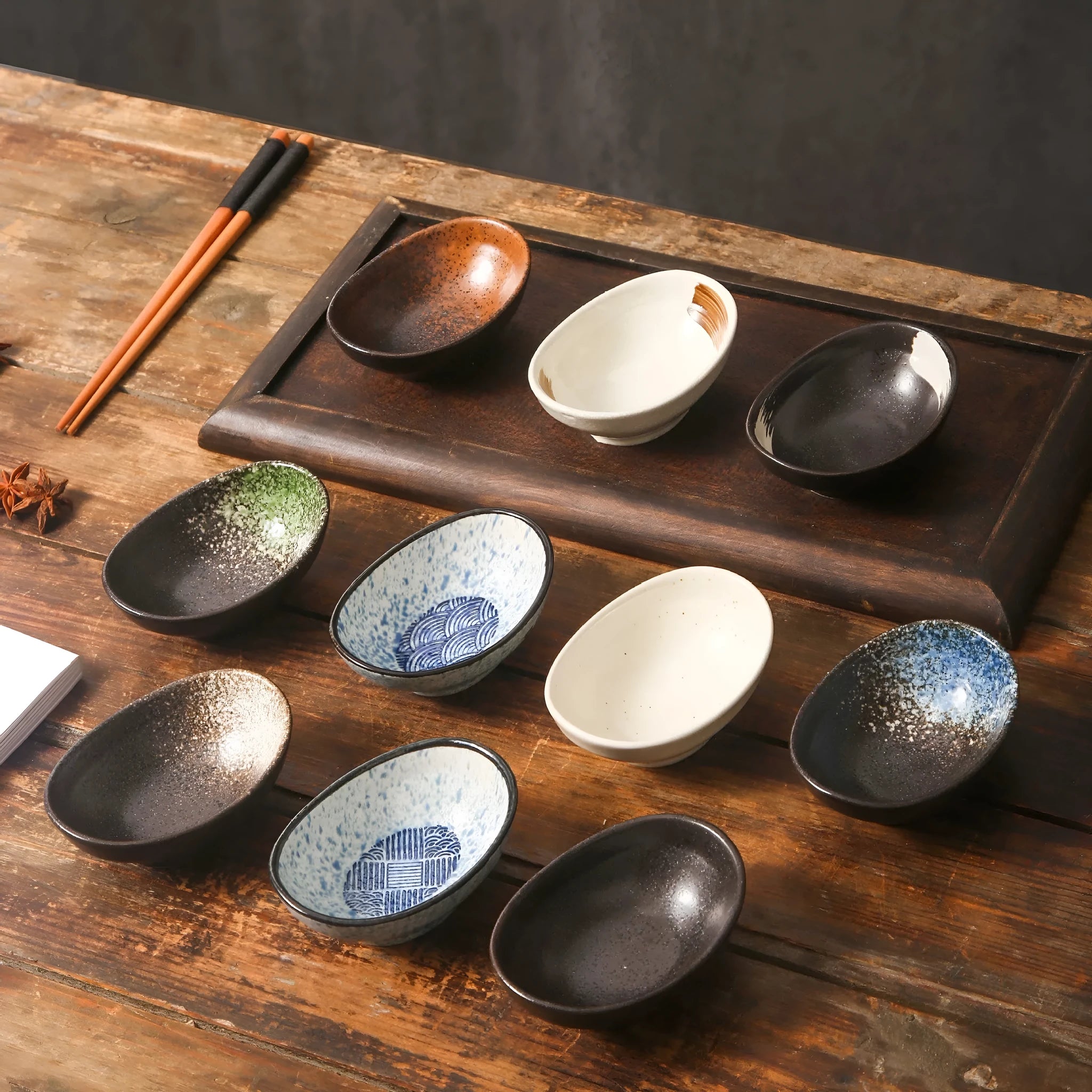Oval Japanese ceramic sauce dipping bowl with traditional pattern design