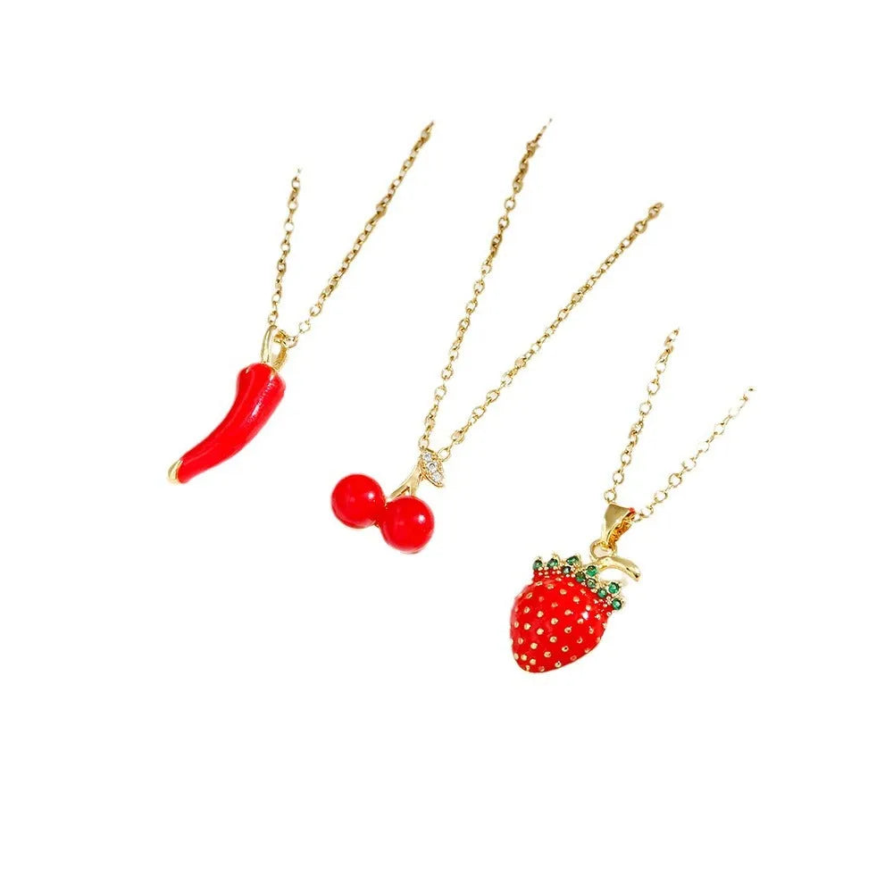Titanium steel necklace with an indie-style cherry, strawberry, and pepper pendant on an O-ring chain.