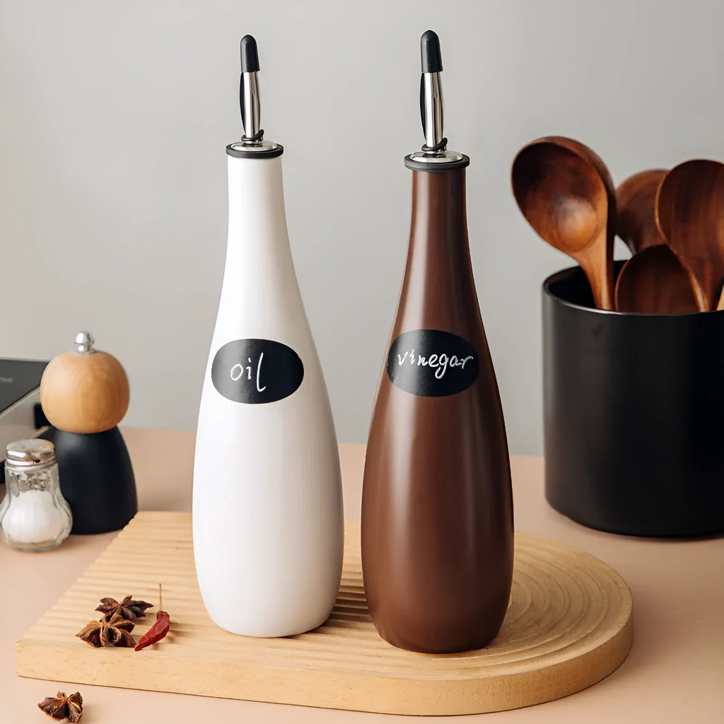 Ceramic kitchen oil pot with sealed spout and conical funnel for cooking oil storage