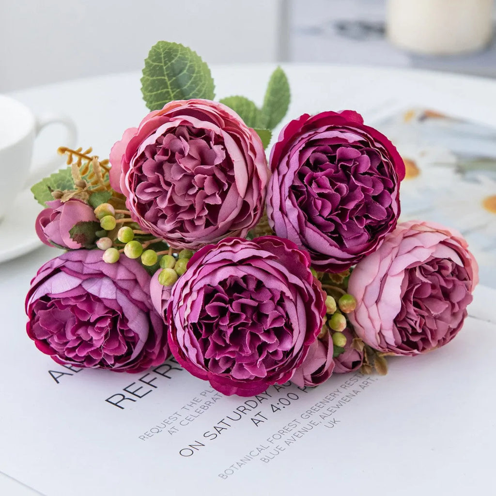 Artificial silk peony bouquet with long stem on white background