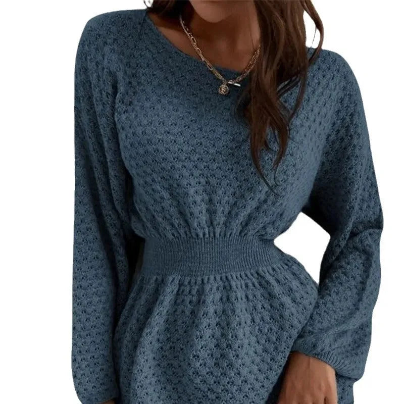 Blue women's knitted dress with crocheted flowers, round neck, and fitted waist.