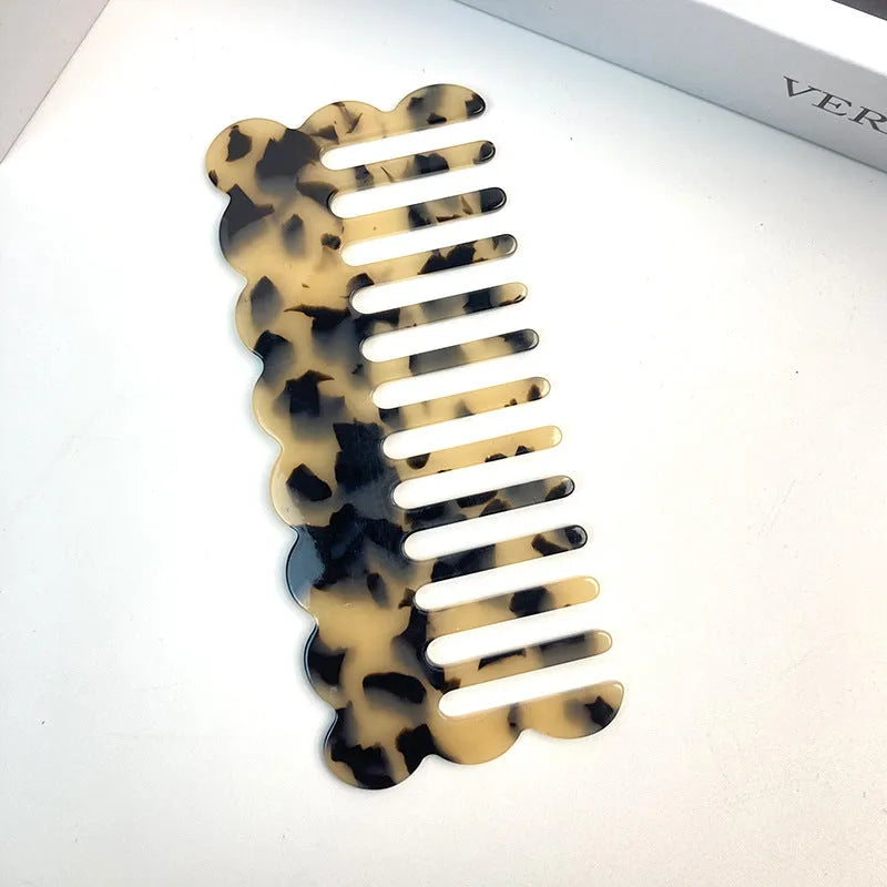 Geometric acetate hair comb with retro wave design in apricot colour