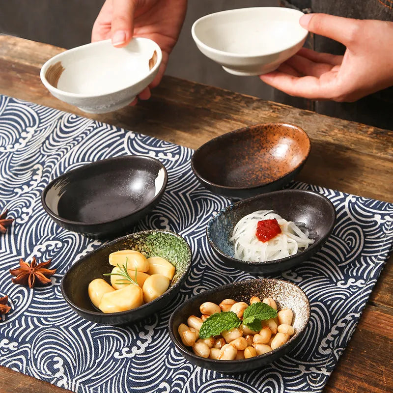 Oval Japanese ceramic sauce dipping bowl with traditional pattern design