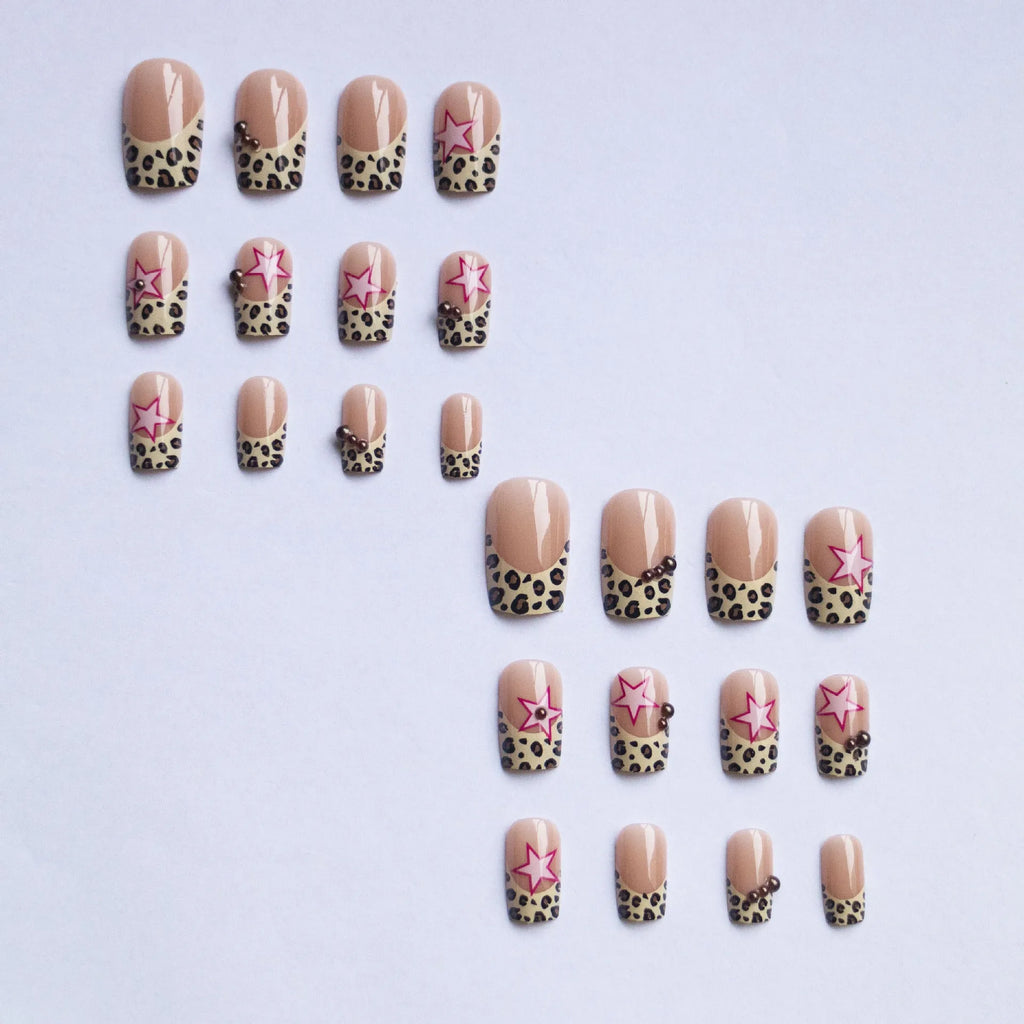 French manicure nail art set with leopard print patterns, five-pointed stars, pearls and diamond decorations