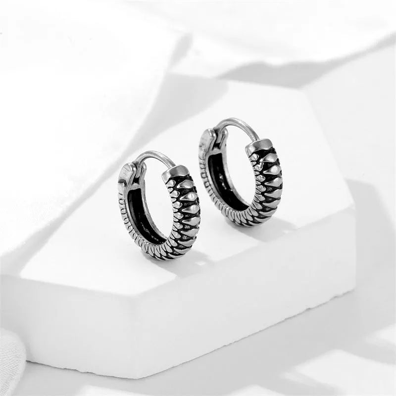 Silver retro twist geometric stripe earrings made from stainless steel with a sporty style.