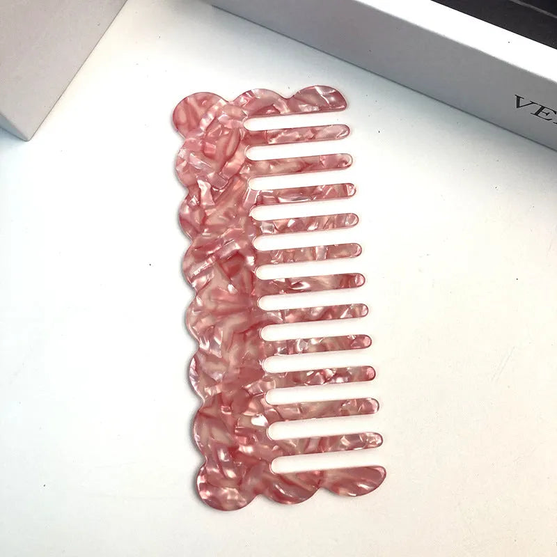 Geometric acetate hair comb with retro wave design in apricot colour