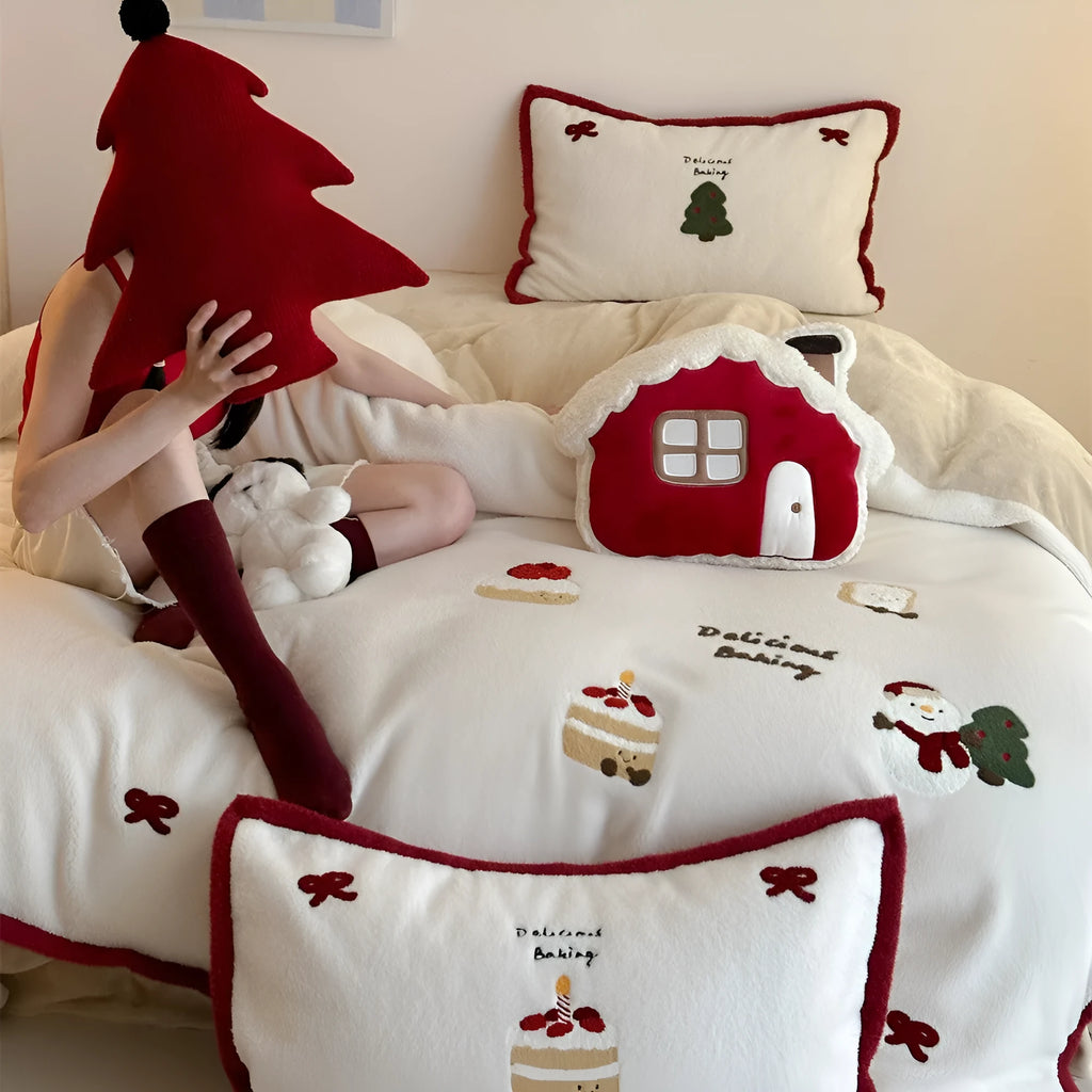 Winter Christmas cartoon bedding four-piece set with bed sheet, pillowcases, and duvet cover