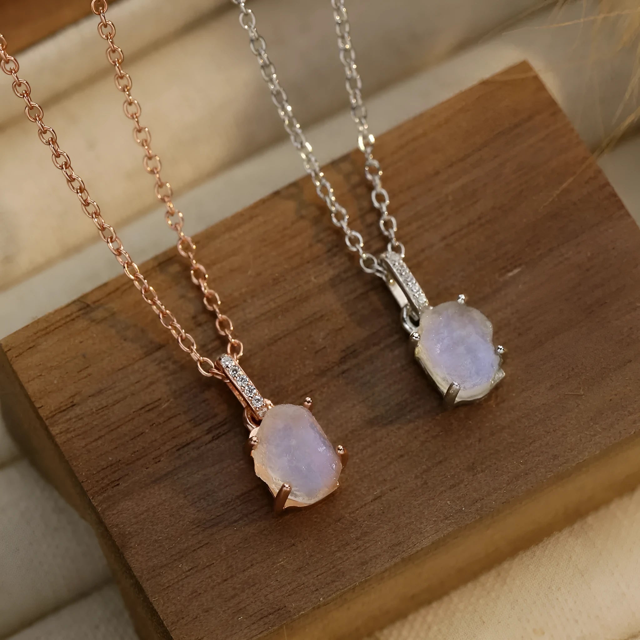 Sterling silver geometric necklace with moonstone pendant on adjustable curb chain