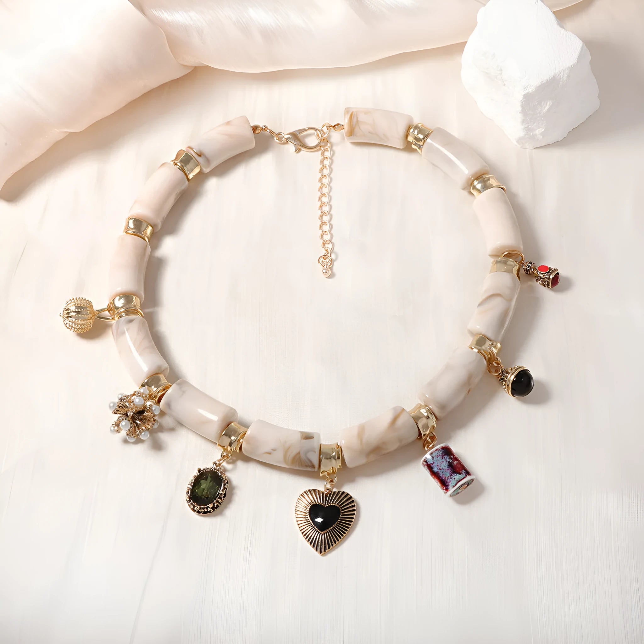 Heart-shaped bamboo pendant necklace with electroplated finish on plastic resin