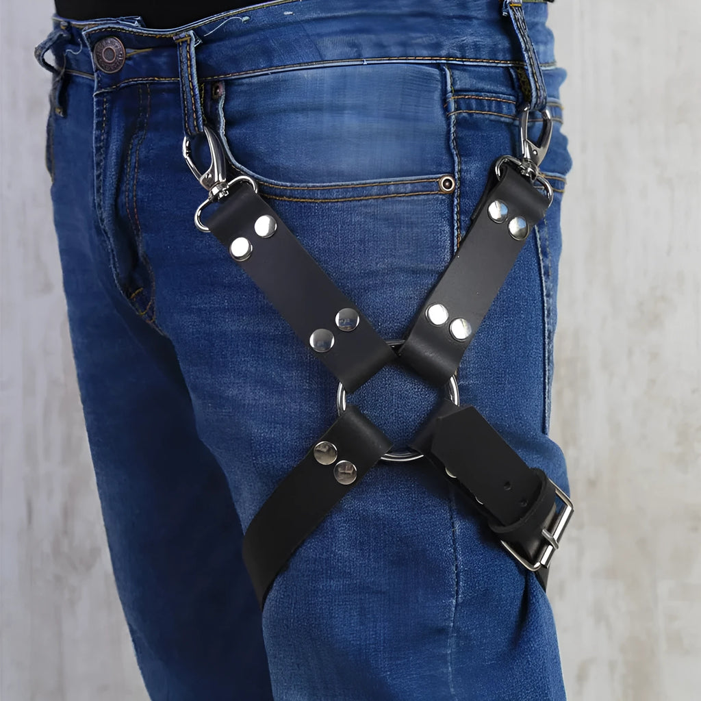 Black PU leather leggings with an elasticated waistband laid flat.