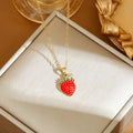 Titanium steel necklace with an indie-style cherry, strawberry, and pepper pendant on an O-ring chain.