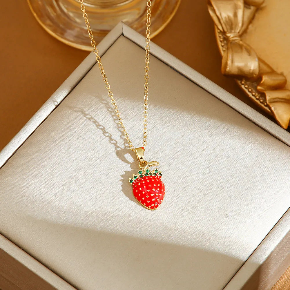 Titanium steel necklace with an indie-style cherry, strawberry, and pepper pendant on an O-ring chain.