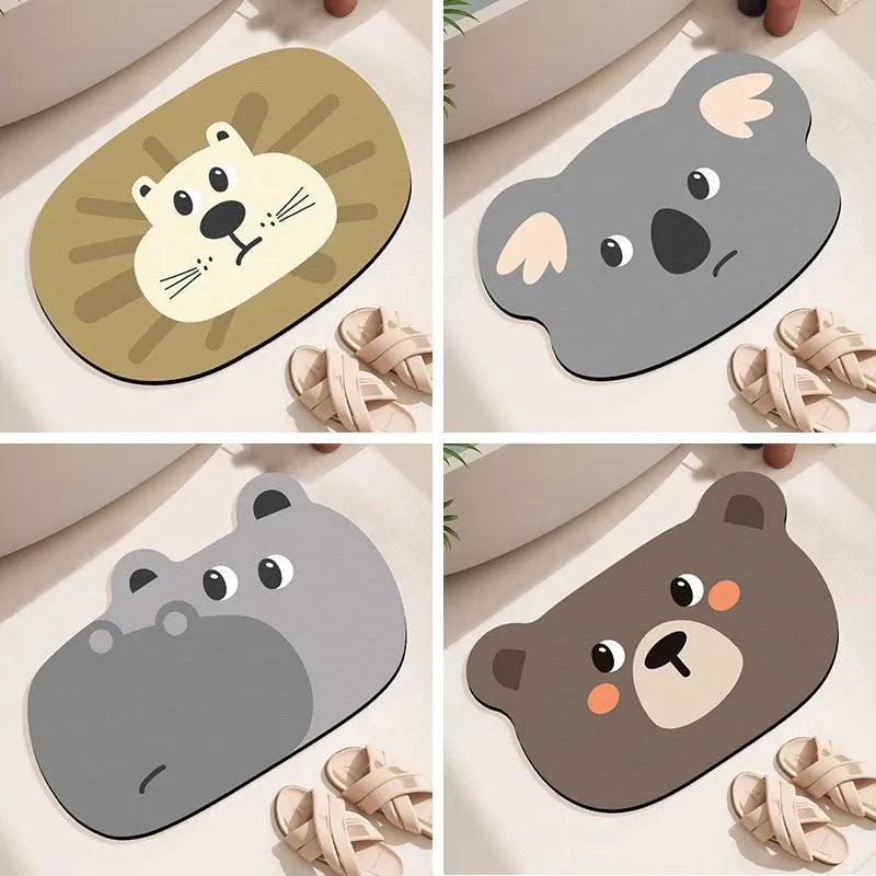 Cartoon animal diatom oil absorbent non-slip bathroom mat in alien shape on a bathroom floor.
