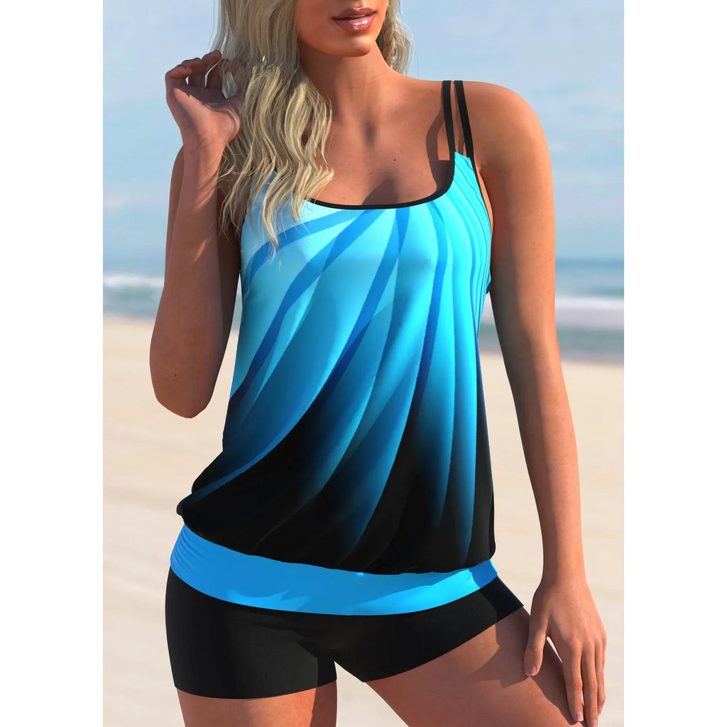 Plus size women's swimsuit with printed butterfly strap top and matching conservative beach shorts