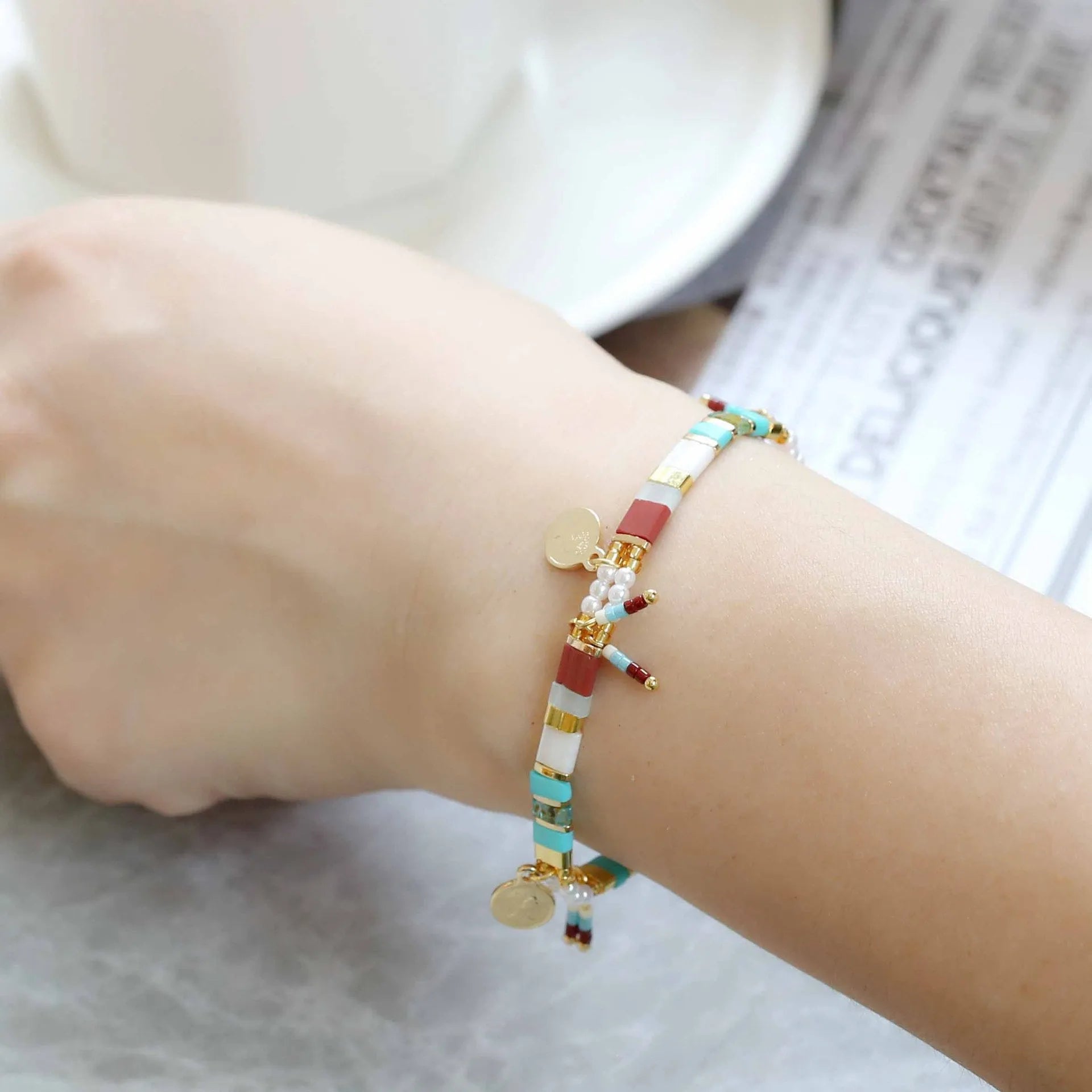 Women's handmade imitation pearl beaded bracelet in a European and American style, showing one of six available colour options.