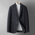 Men's slim fit wool blend suit jacket in a solid colour on a hanger.