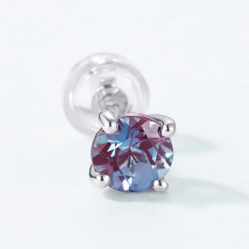 Simple geometric sterling silver stud earrings with a round cultivated Alexandrite stone.