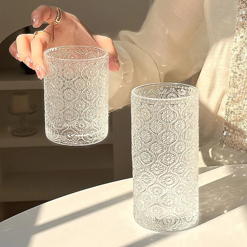 A solid colour Begonia carved glass water cup showing short 250ml and tall 360ml size options.
