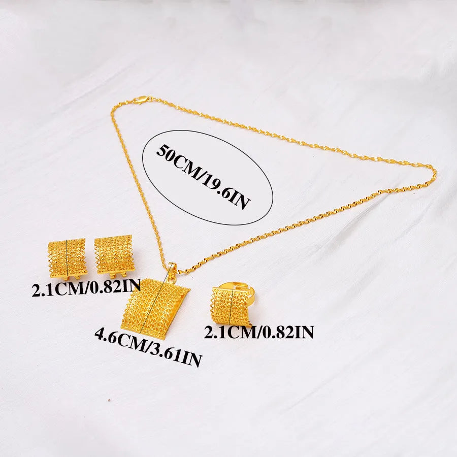 Gold coloured bridal jewellery set with necklace, earrings and ring on display