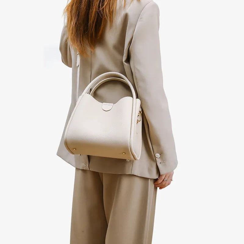Genuine leather vegetable basket handbag in cylindrical shape with open pocket outer and sandwich zipper bag interior