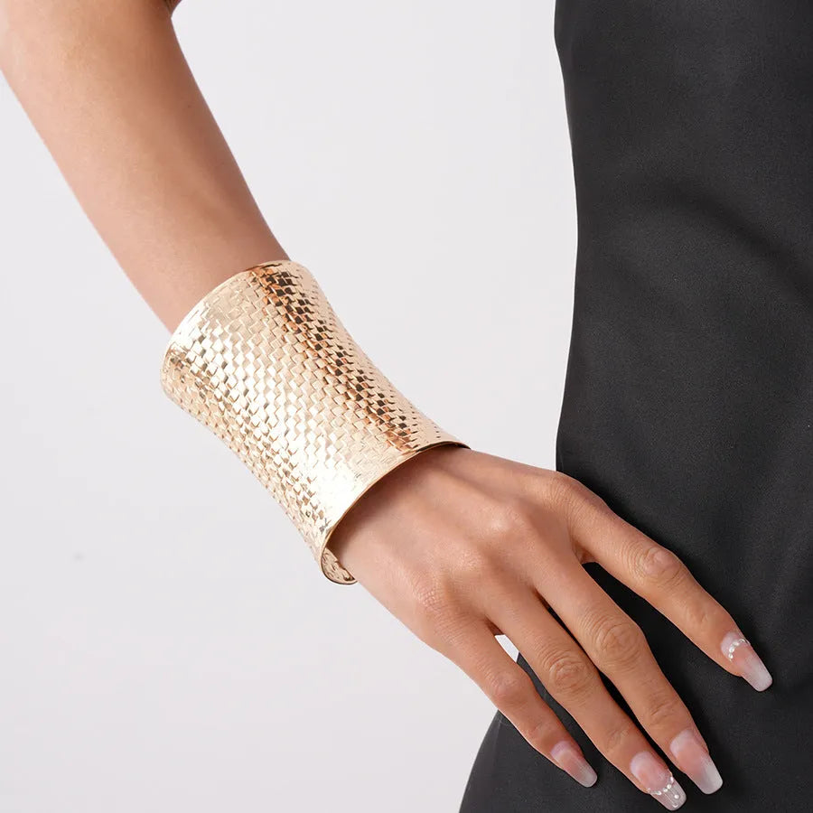 Women's vintage gold or silver metal bracelet with exaggerated round design