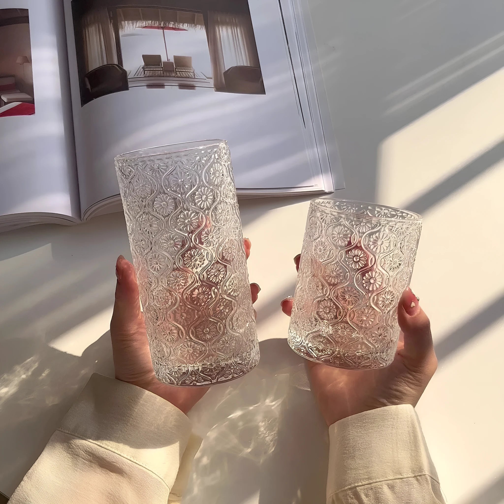 A solid colour Begonia carved glass water cup showing short 250ml and tall 360ml size options.