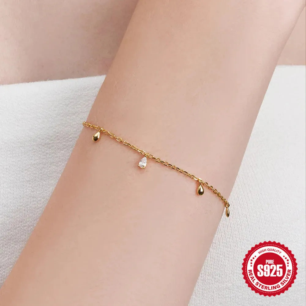 Gold colour S925 sterling silver bracelet with geometric water drop diamond pendant for women